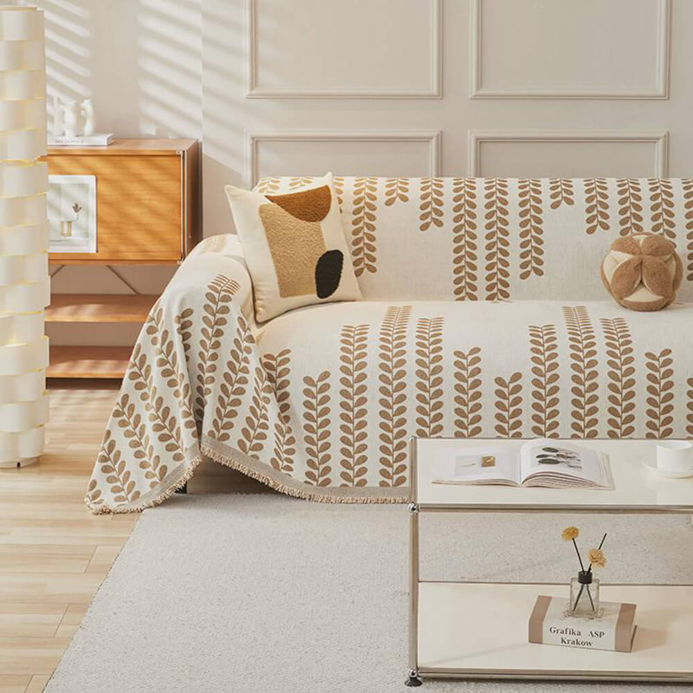 Pokrowiec na kanapę z motywem liści i frędzlami – elegancja i komfort