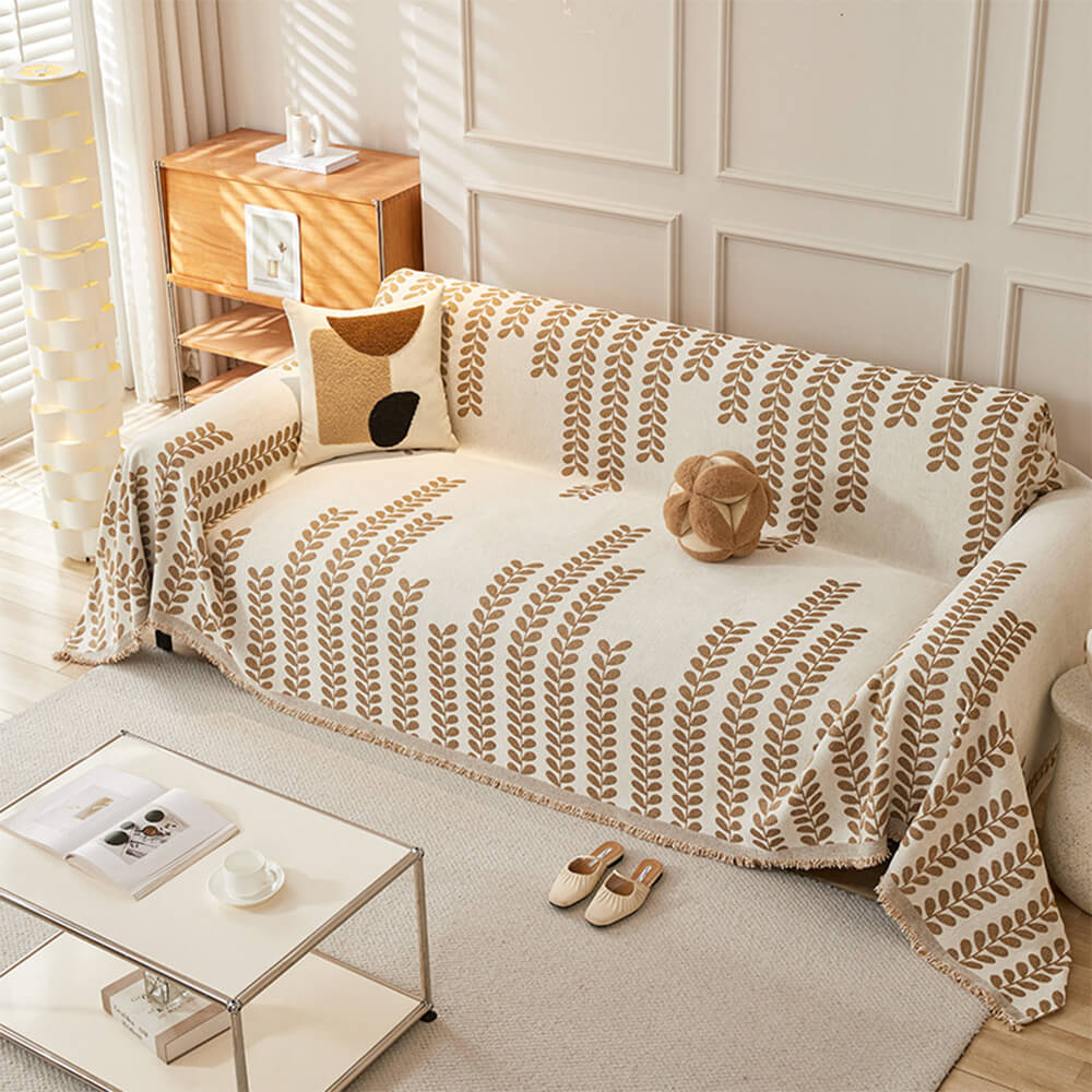 Husă De Canapea Cu Motive De Frunze Și Franjuri – Eleganță Și Confort 